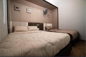 Ένα ή περισσότερα κρεβάτια σε δωμάτιο στο Maritime suite Karpal sign sea view