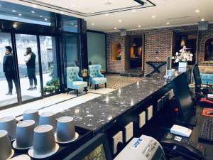 Ο χώρος του λόμπι ή της ρεσεψιόν στο Xana Hotelle Xi'an Zhonglou Luoma +199 φωτογραφίες