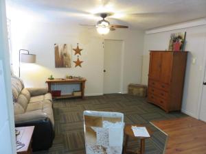 a living room with a couch and a table at Hotel LaBonte in Douglas +33 photos