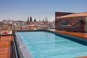 Bazén v ubytování Palacio de los Duques Gran Meliá - The Leading Hotels of the World nebo v jeho okolí