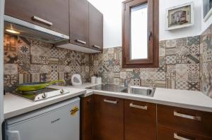 Η κουζίνα ή μικρή κουζίνα στο Villa Kastraki +132 φωτογραφίες