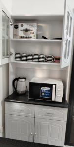 Kuchyň nebo kuchyňský kout v ubytování Affordable 2 storey transient house with free wifi in Camella Homes Koronadal