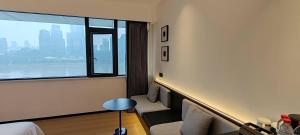 Χώρος καθιστικού στο Chongqing Justom Family Serviced Apartments 3