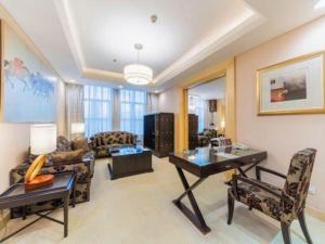 Posezení v ubytování Grand Land Hotel