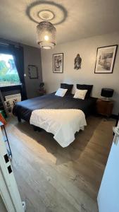 Postel nebo postele na pokoji v ubytování Les dunes le Lima