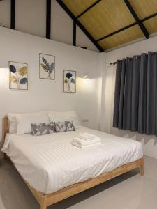 Postel nebo postele na pokoji v ubytování Sea Escape Koh Yao Yai