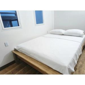 Ένα ή περισσότερα κρεβάτια σε δωμάτιο στο Posada Campestre en Doradal