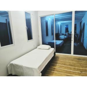 Ένα ή περισσότερα κρεβάτια σε δωμάτιο στο Posada Campestre en Doradal +21 φωτογραφίες