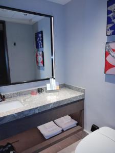 Ένα μπάνιο στο Chongqing Justom Family Serviced Apartments 3