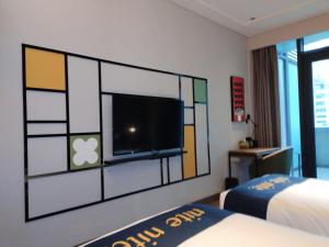 Μια τηλεόραση ή/και κέντρο ψυχαγωγίας στο Chongqing Justom Family Serviced Apartments 3 +19 φωτογραφίες