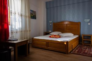 Un pat sau paturi într-o cameră la Hotel Funnytime