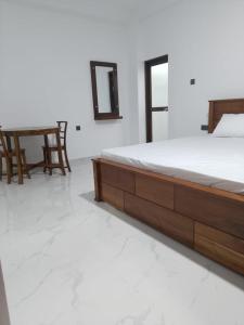 Ένα ή περισσότερα κρεβάτια σε δωμάτιο στο Hirudee Villa