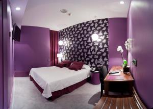 Cama o camas de una habitación en Hotel Santo Domingo