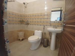 Ένα μπάνιο στο Hotel O DUNARA