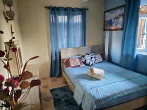 Postel nebo postele na pokoji v ubytování Villa Samuel