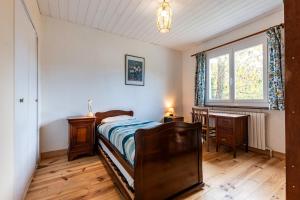 Postel nebo postele na pokoji v ubytování Maison En Bord De Rivière