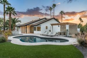 a house with a swimming pool in a yard at The MYAH by Porter NEWLY REMODELED Enjoy the Pool Firepit Luxury in Phoenix