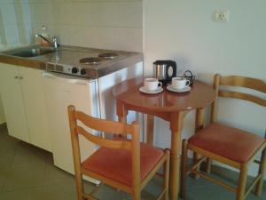 Virtuvė arba virtuvėlė apgyvendinimo įstaigoje Thalassa View Apartments