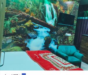 Μια τηλεόραση ή/και κέντρο ψυχαγωγίας στο New Gaytri Place Near by Prem Mandir