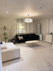 Posezení v ubytování 넓고 편리한 숙소