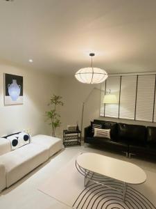 Postel nebo postele na pokoji v ubytování 넓고 편리한 숙소