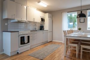 Η κουζίνα ή μικρή κουζίνα στο Ski in/Ski out | Sauna | WiFi | Terrace