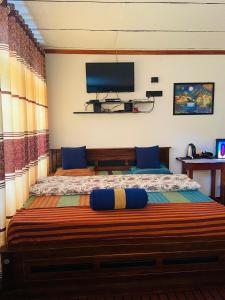 Postel nebo postele na pokoji v ubytování Nine arch echo Villa Ella