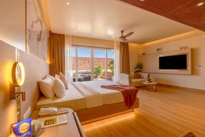 Μια τηλεόραση ή/και κέντρο ψυχαγωγίας στο BK Studio And Rooms Near Huda City Centre