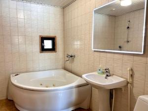 Koupelna v ubytování Himos Mökki + 18 fotografií