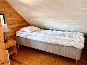 Postel nebo postele na pokoji v ubytování Himos Mökki