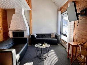 Posezení v ubytování Himos Mökki