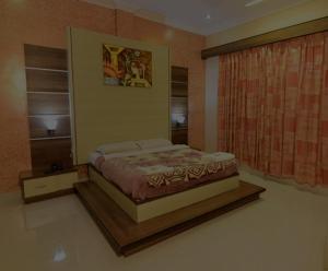 Hotel Ashlesh Manipal客房内的一张或多张床位