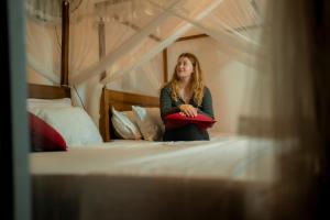 Postel nebo postele na pokoji v ubytování Rainforest field view resort