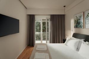 Ένα ή περισσότερα κρεβάτια σε δωμάτιο στο City Center Urban Home +7 φωτογραφίες