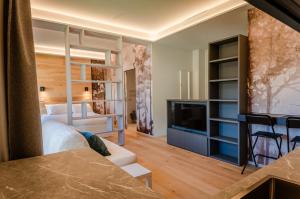 Postel nebo postele na pokoji v ubytování Aosta Holiday Apartments - Rayon