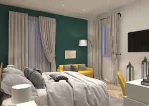 サレルノにあるResidence Arechiの緑の壁のリビングルーム(黄色のソファ付)