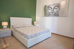 Postel nebo postele na pokoji v ubytování Maison Étoile