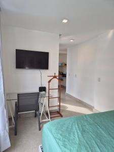 Телевизор и/или развлекательный центр в Studio Premium A7A - Recém Inaugurado, tudo novo