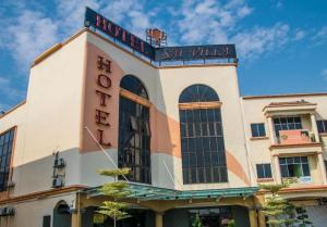 ニライにあるSwing & Pillows - Dataran Nilaiの上に看板がある建物