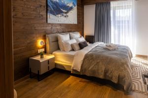 Ένα ή περισσότερα κρεβάτια σε δωμάτιο στο Winterfell in New Gudauri