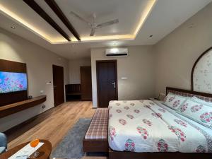 Ένα ή περισσότερα κρεβάτια σε δωμάτιο στο Saraiville- A Boutique Riverside Resort +84 φωτογραφίες