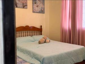 Postel nebo postele na pokoji v ubytování Happinest Transient Home + 6 fotografií