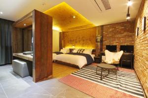 Ένα ή περισσότερα κρεβάτια σε δωμάτιο στο Lime Hotel