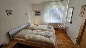 Postel nebo postele na pokoji v ubytování Arber Haus Paula