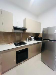 Køkken eller tekøkken på Casa Santorini Negombo Resort Apartment