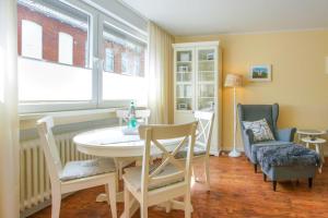 Posezení v ubytování Middenmang + 5 fotografií