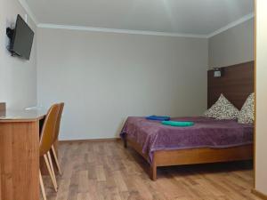 Postel nebo postele na pokoji v ubytování Anastasia