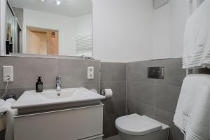 Ένα μπάνιο στο Ferienhaus Gröön Huus