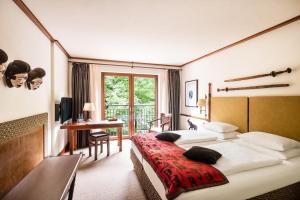 Ένα ή περισσότερα κρεβάτια σε δωμάτιο στο Park-Hotel Hagenbeck +75 φωτογραφίες