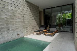 La alberca dentro o cerca de Oceanphere Villa by Prop Hopper